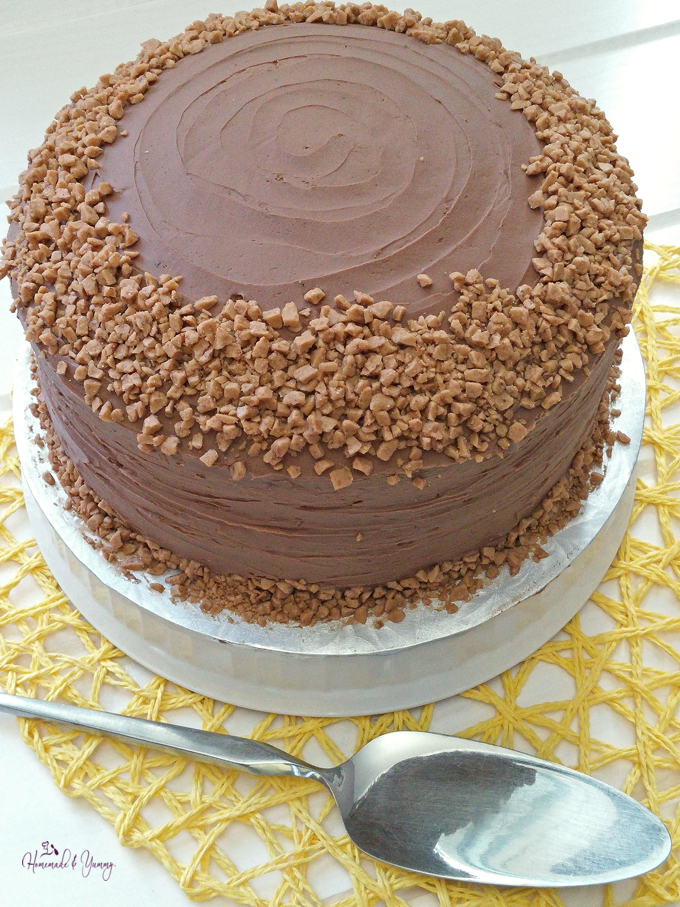 Close up of Toffee Cake on a cake stand ready to serve.