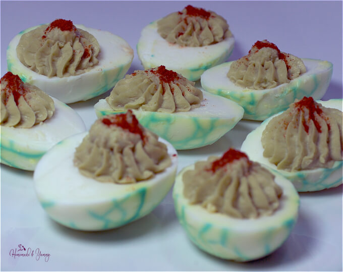 Closeup of devilled eggs on a plate.