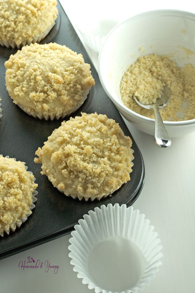 Add the crumb topping on the muffins.