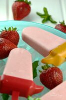Strawberry Cheesecake Popsicles are the perfect summer treat. Fresh strawberries, cream cheese, yogurt and graham cracker crumbs, combine to make this delicious, creamy, frozen version of a classic dessert. | homemadeandyummy.com