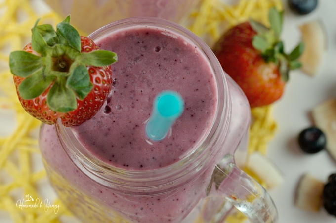 Triple Berry Coconut Smoothie is pretty and tasty. Flavoured with 3 types of fresh berries, raw coconut slices and yogurt, this healthy smoothie is perfect for breakfast or lunch. | homemadandyummy.com