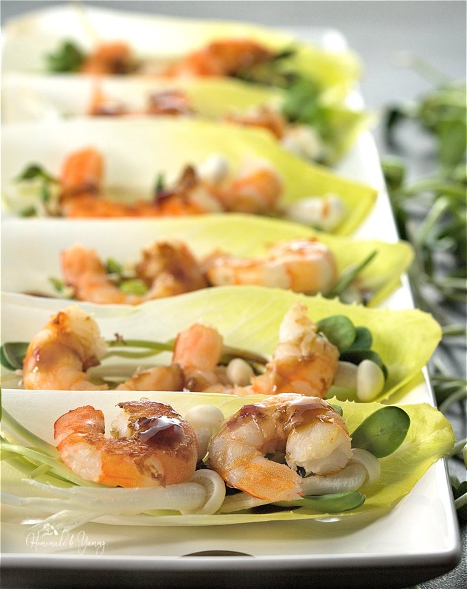 Close up of shrimp cups on a serving platter ready to serve.