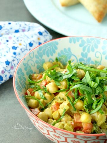 Quick Chickpea Curry is perfect for a fast and easy weeknight dinner. Flavourful with a hint of heat. Gluten free, vegan, and a great meat alternative meal. | homemadeandyummy.com