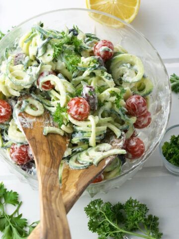 Creamy Goat Cheese Greek Zoodle Salad is fun to make. Bursting with Mediterranean flavours. Makes the perfect side to any meal, especially in grilling season. | homemadeandyummy.com