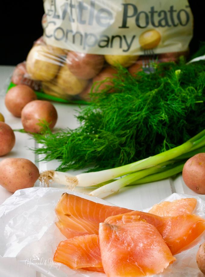 Picture of recipe ingredients, smoked salmon, fresh dill, green onions and baby potatoes.