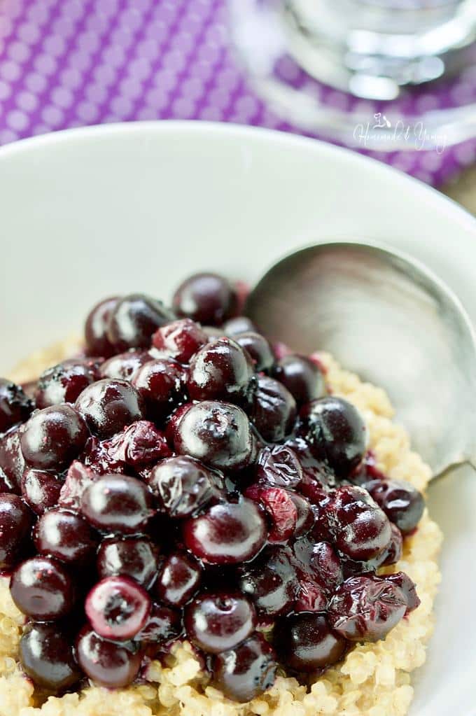 Closeup of roasted blueberry and quinoa in a bowl.