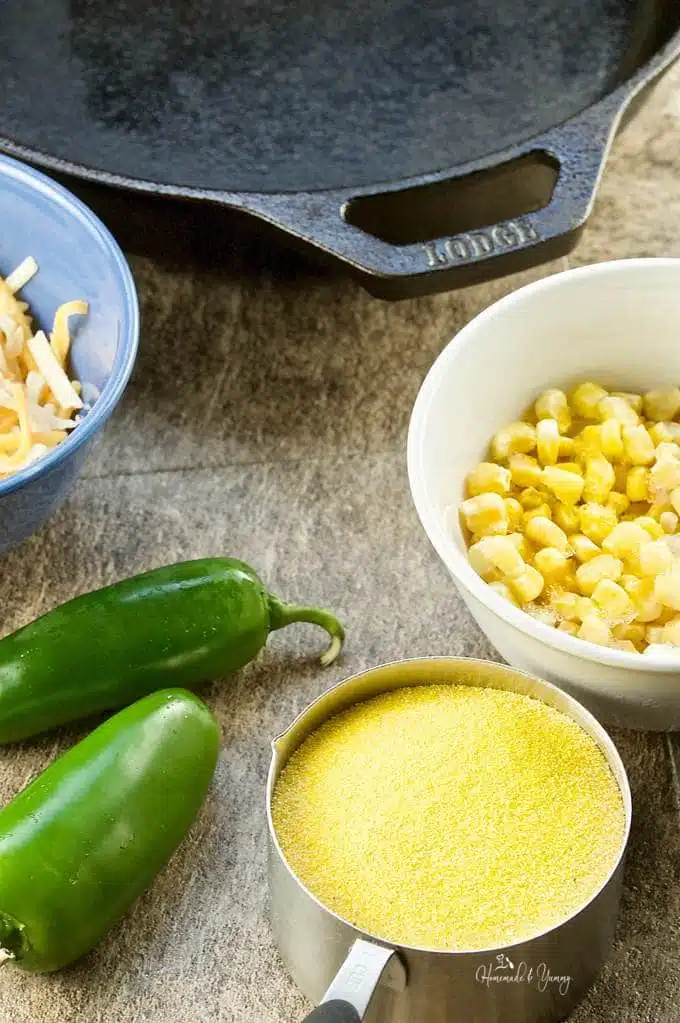 Recipe ingredients, cornmeal, corn, cheese and jalapeno peppers.