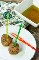 Easy Olive Tapenade Cocktail Party Meatballs on an appetizer plate