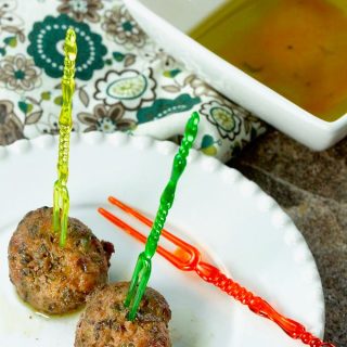 Easy Olive Tapenade Cocktail Party Meatballs on an appetizer plate