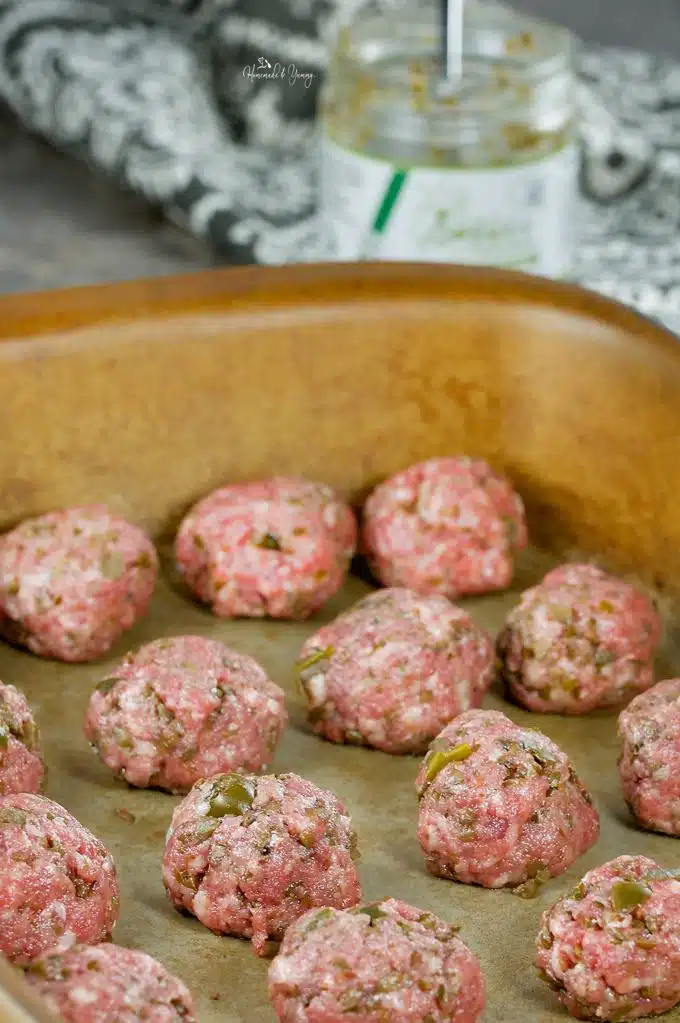Easy Olive Tapenade Cocktail Party Meatballs in a pan ready for the oven
