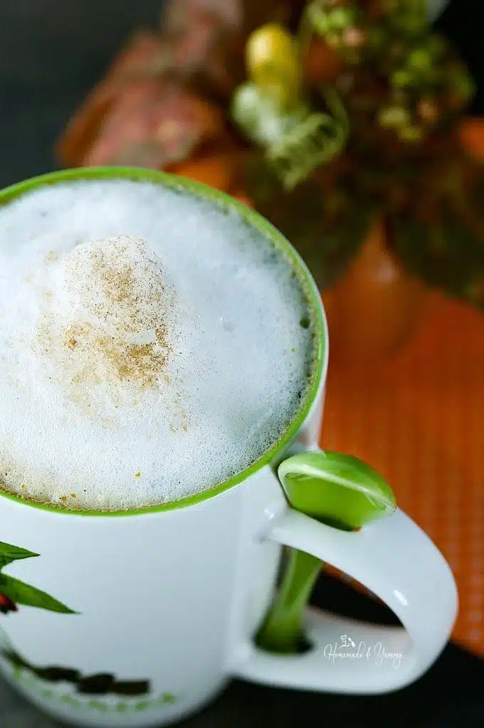 Foam on top of a fall latte.