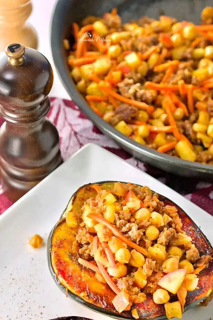Baked stuffed squash on a plate.