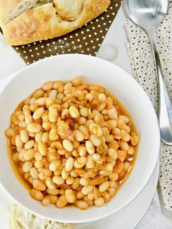 Overhead shot of pressure cooked baked beans in a bowl.