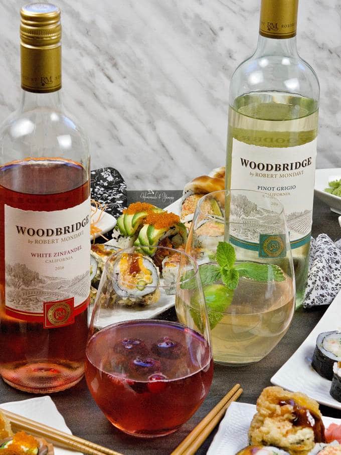 Wine Spritzers made with Woodbridge by Robert Mondavi Wines and plates of sushi.
