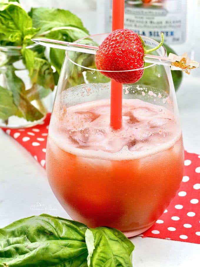 Strawberry cocktail with fresh basil.