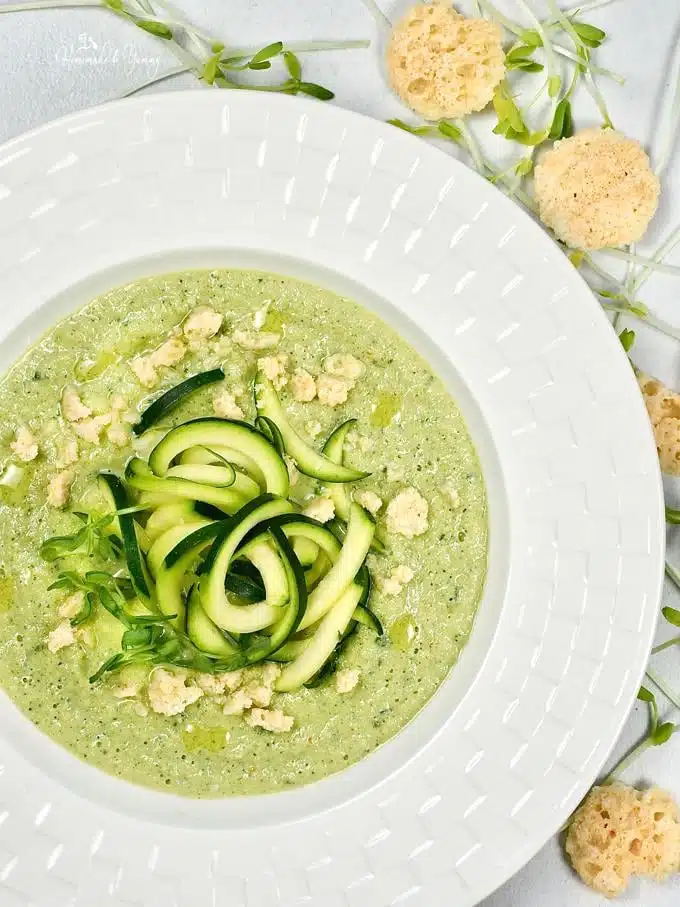 Overhead shot of Zucchini Noodle Gazpacho Cold Blender Soup in a bowl ready to eat.
