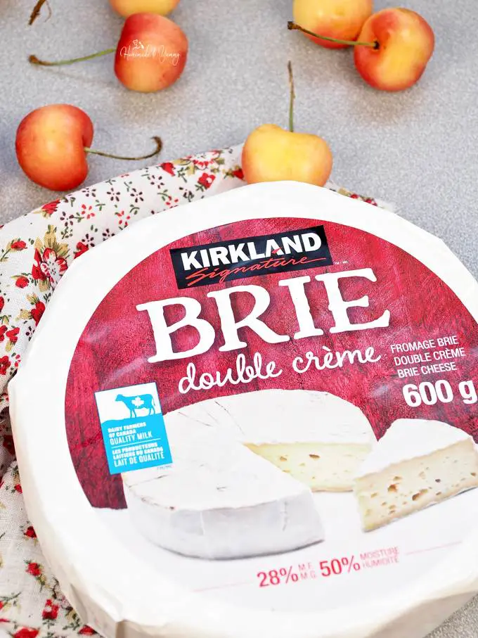 A wheel of brie for cold smoking.