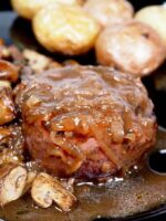 Homemade Onion Gravy with Red Wine on top of steak.