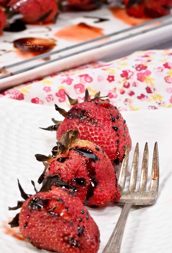 Grilled Strawberry Kabobs on a plate ready to eat.