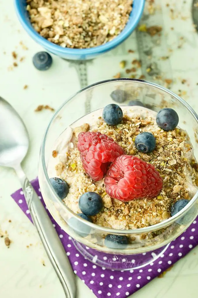 Overhead shot of Mocha Coffee Yogurt topped with berries and granola