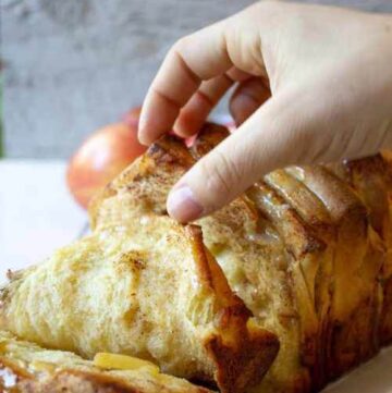 Pull apart apple bread on a plate.