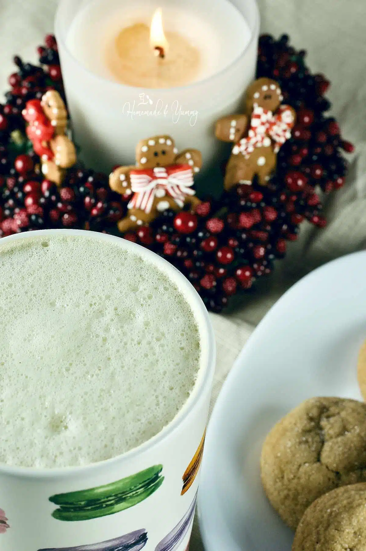 Holiday Tea Latte and some cookies on a plate.
