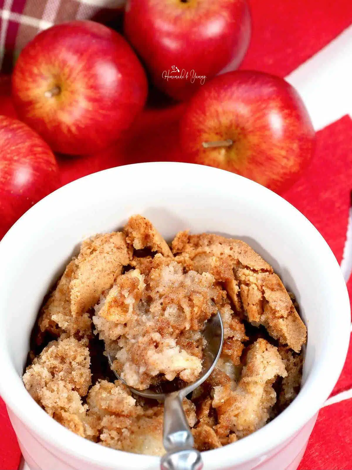 A spoonful of old fashioned apple pudding.