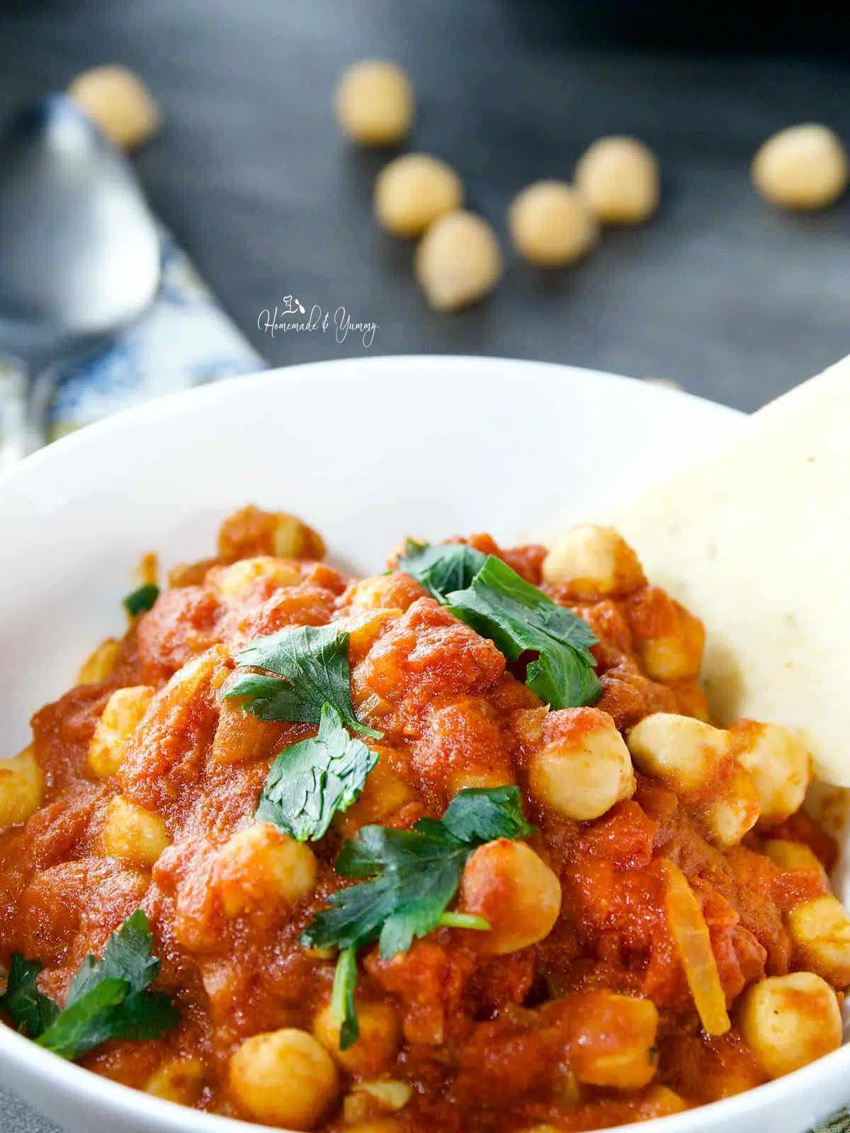 Vegan chickpea curry in bowl.