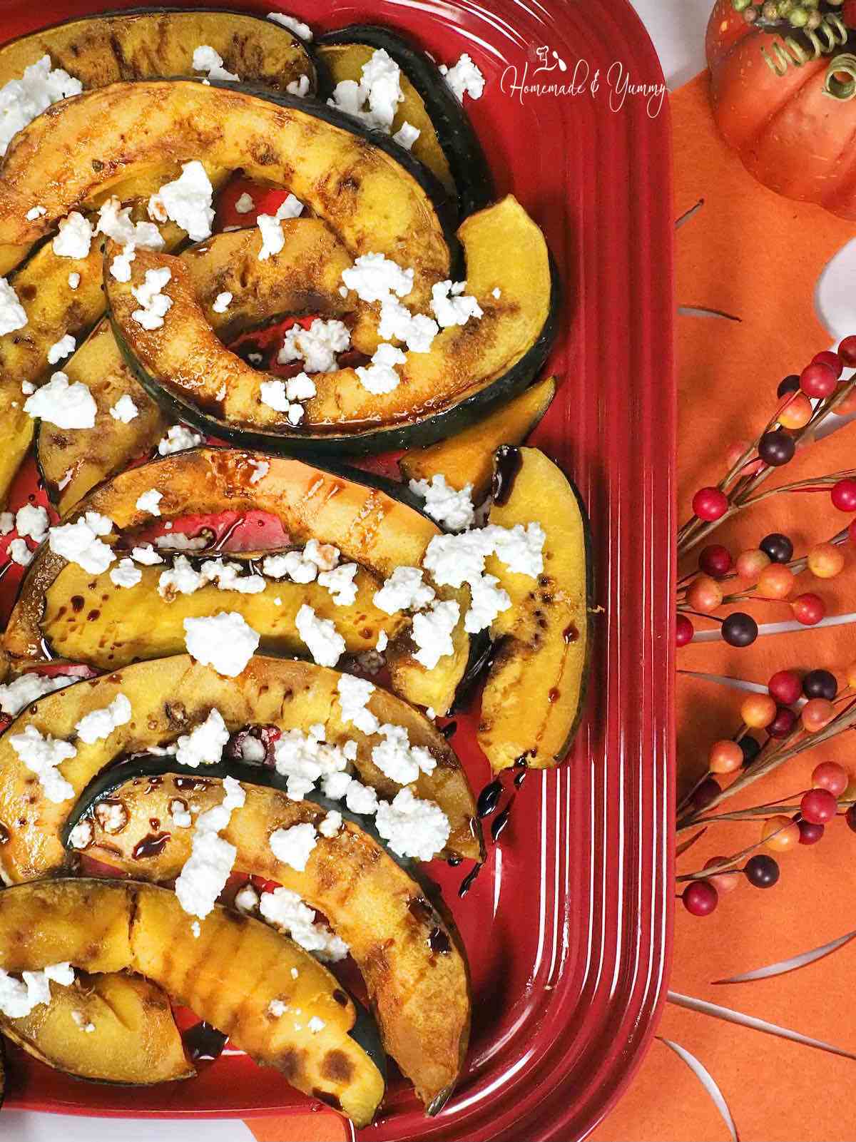 Roasted squash slices with balsamic and feta cheese.