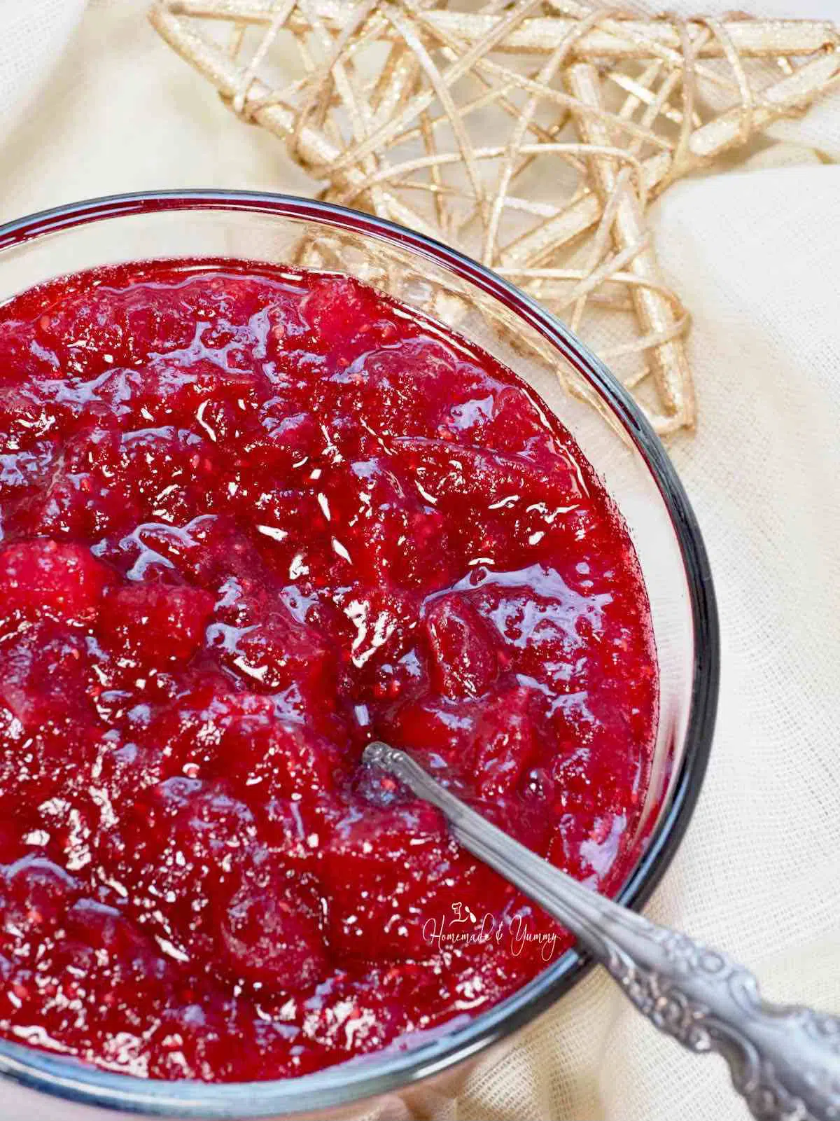A dish of cranberry sauce on the holiday dinner table.