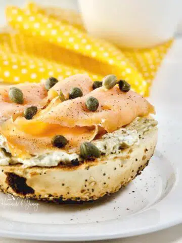 Smoked salmon and cream cheese on a bagel.