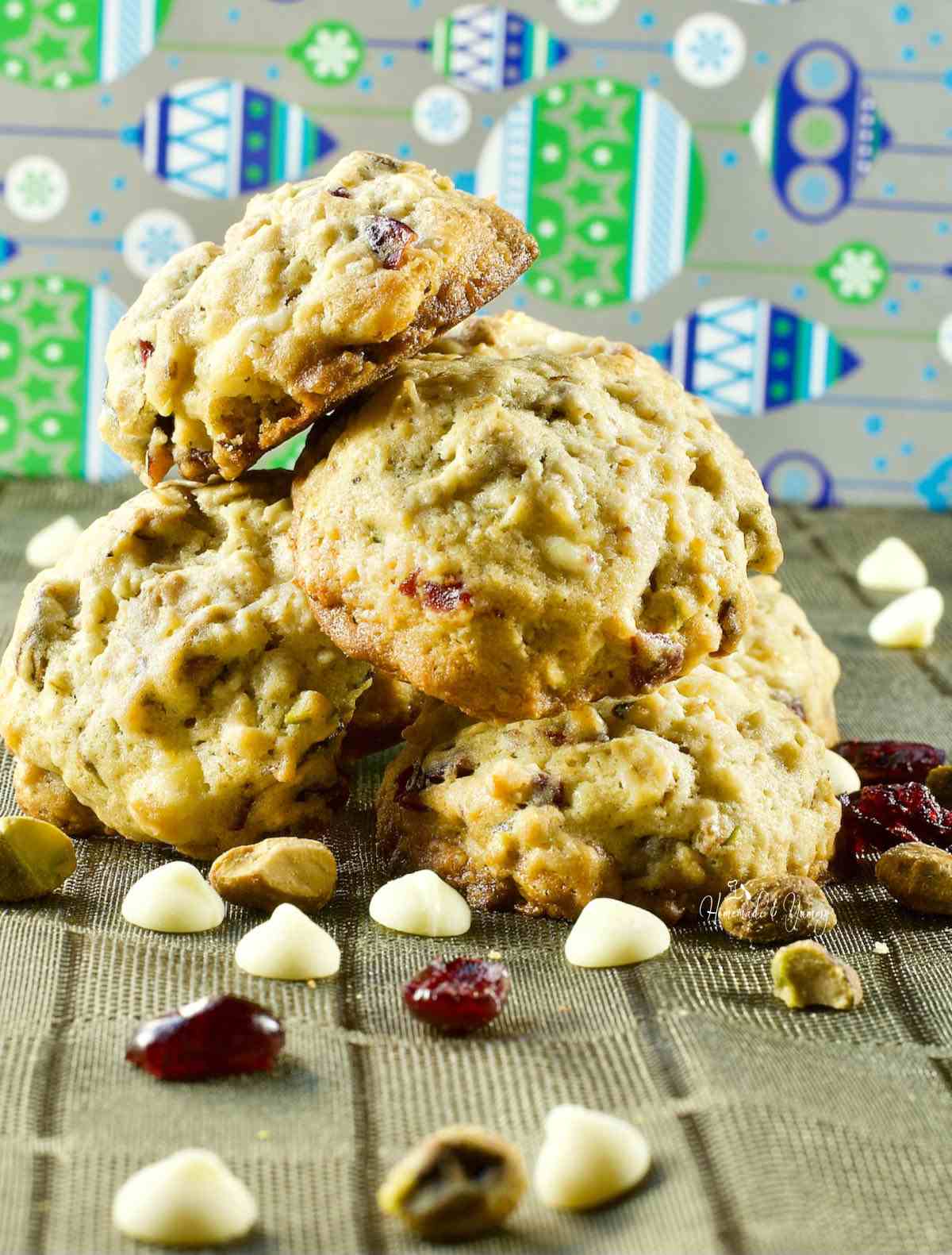 Oatmeal Cranberry White Chocolate Cookies piled on a table.