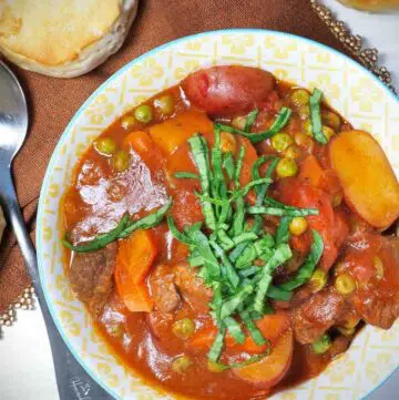 A bowl of lamb stew made with red wine.