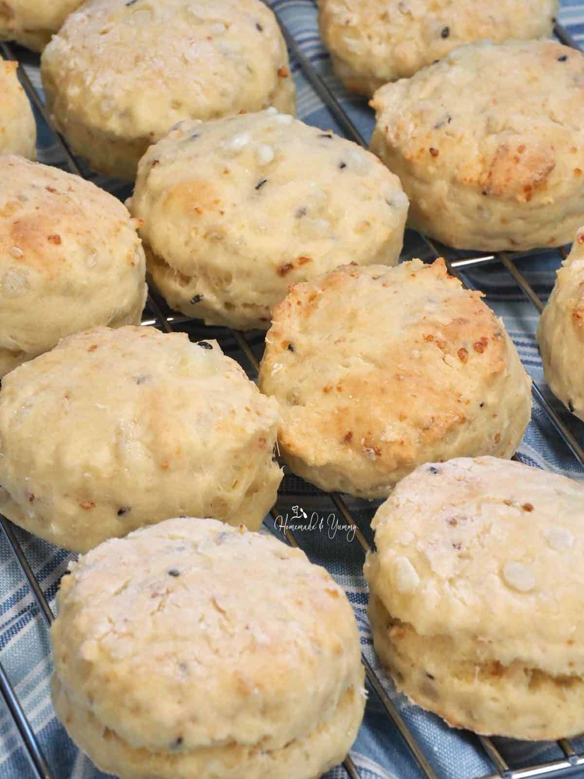 Warm biscuits cooling on a rack.