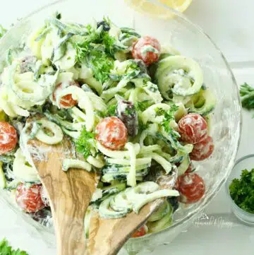 A bowl of Greek Zoodle Salad ready to serve.