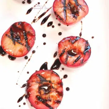 Grilled Plums drizzled with honey.