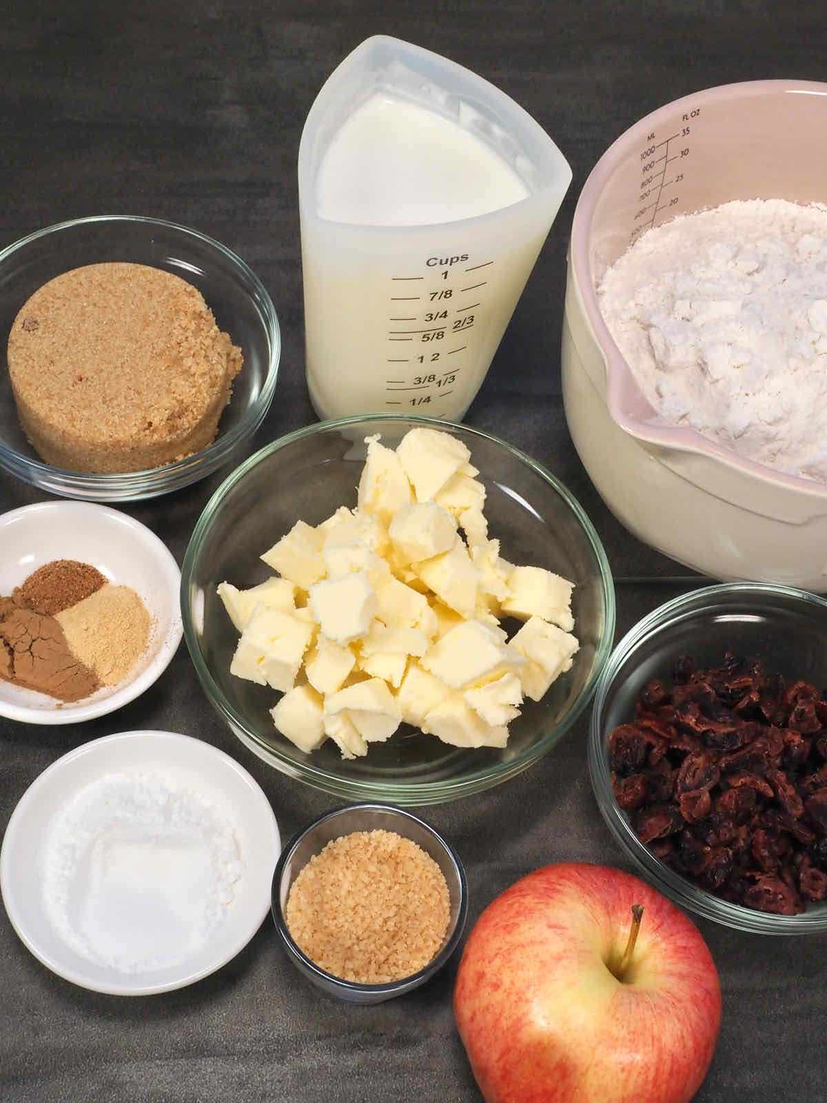 Ingredients to make scones with cranberries and apples.