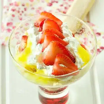 Lemon Curd Parfait with sliced strawberries.