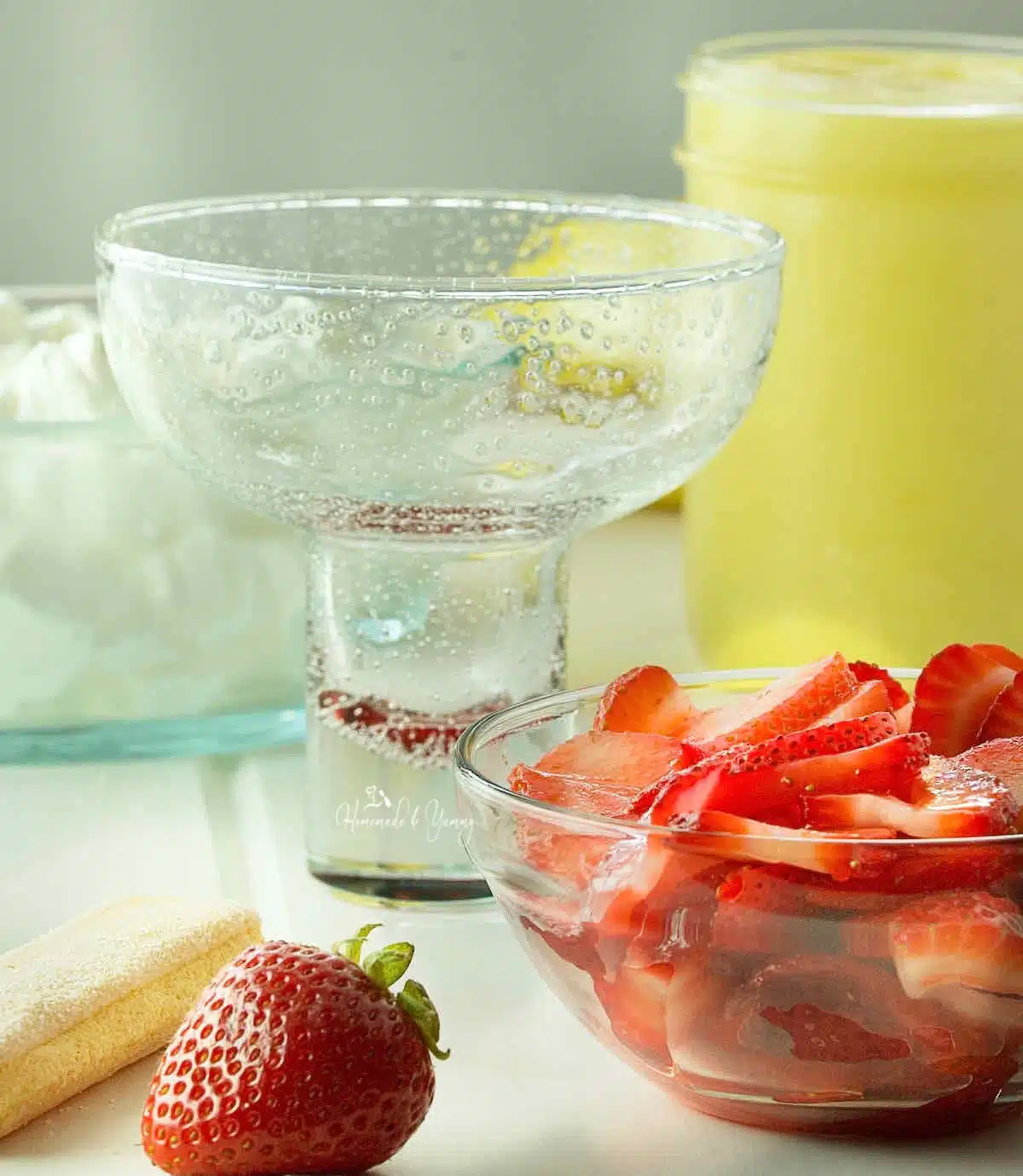 Ingredients needed to make a layered lemon curd dessert.