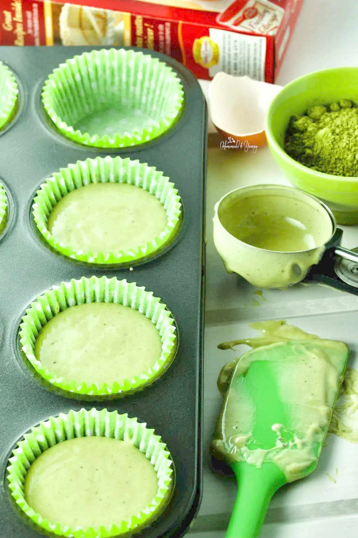 Cupcake batter made with matcha green tea.
