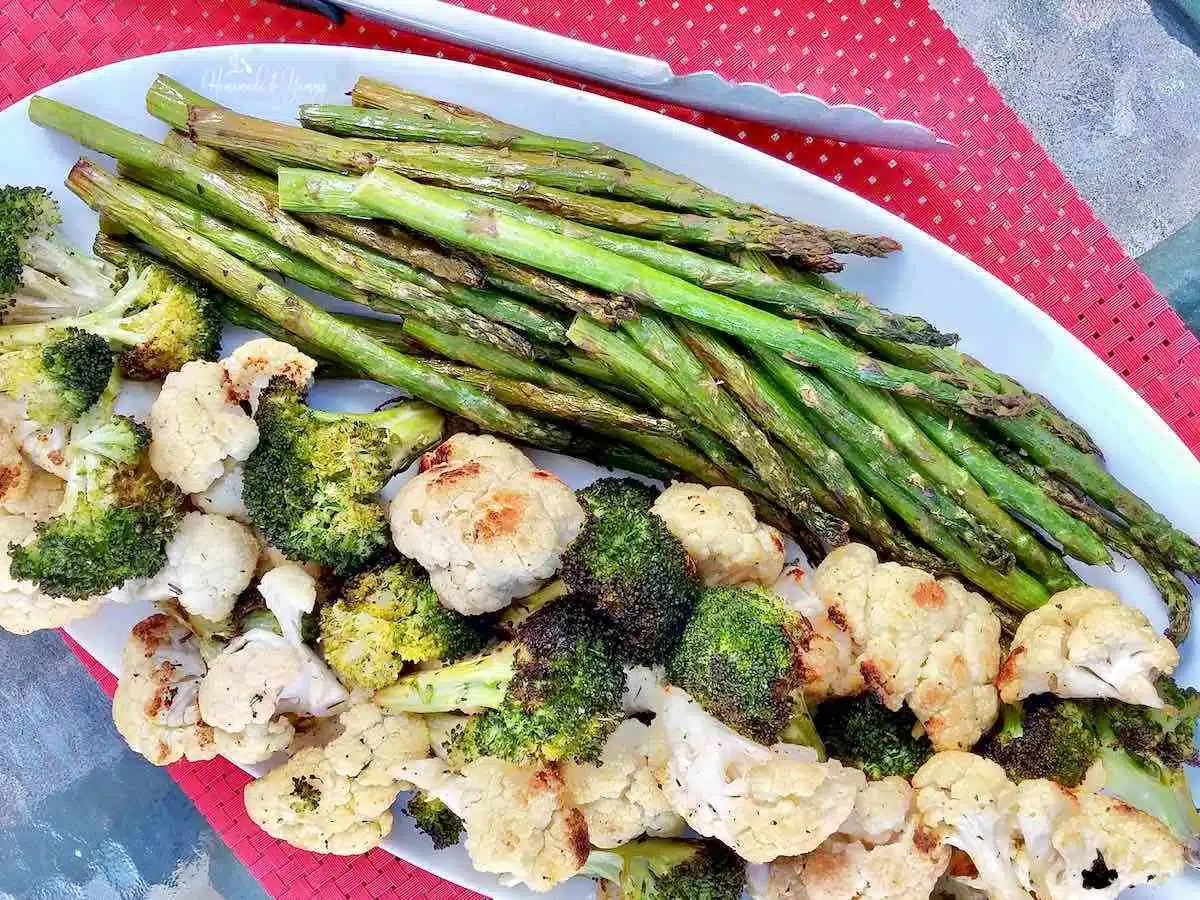 A plate of delicious veggies cooked on the grill.