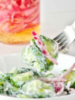 Cucumber and Onion Salad with sour cream and dill dressing.