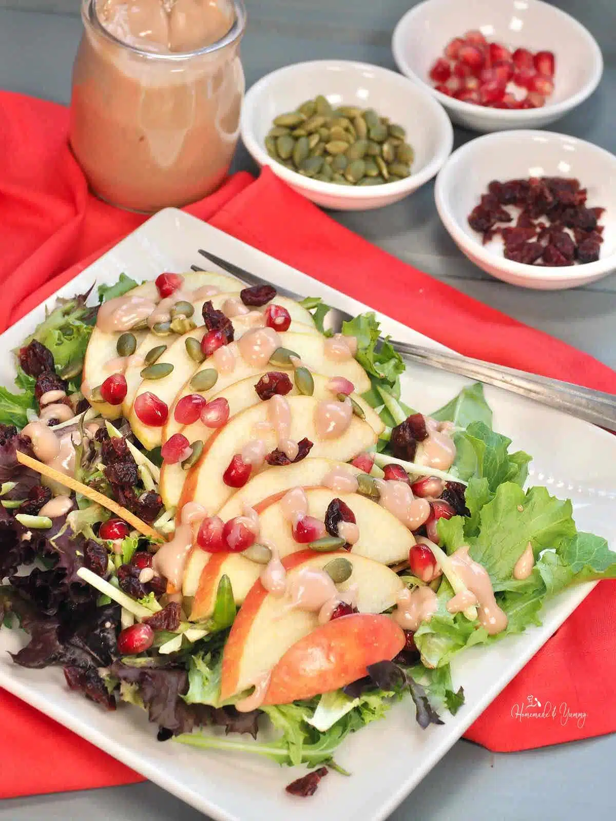 Easy Harvest Salad with apples and creamy pomegranate dressing.