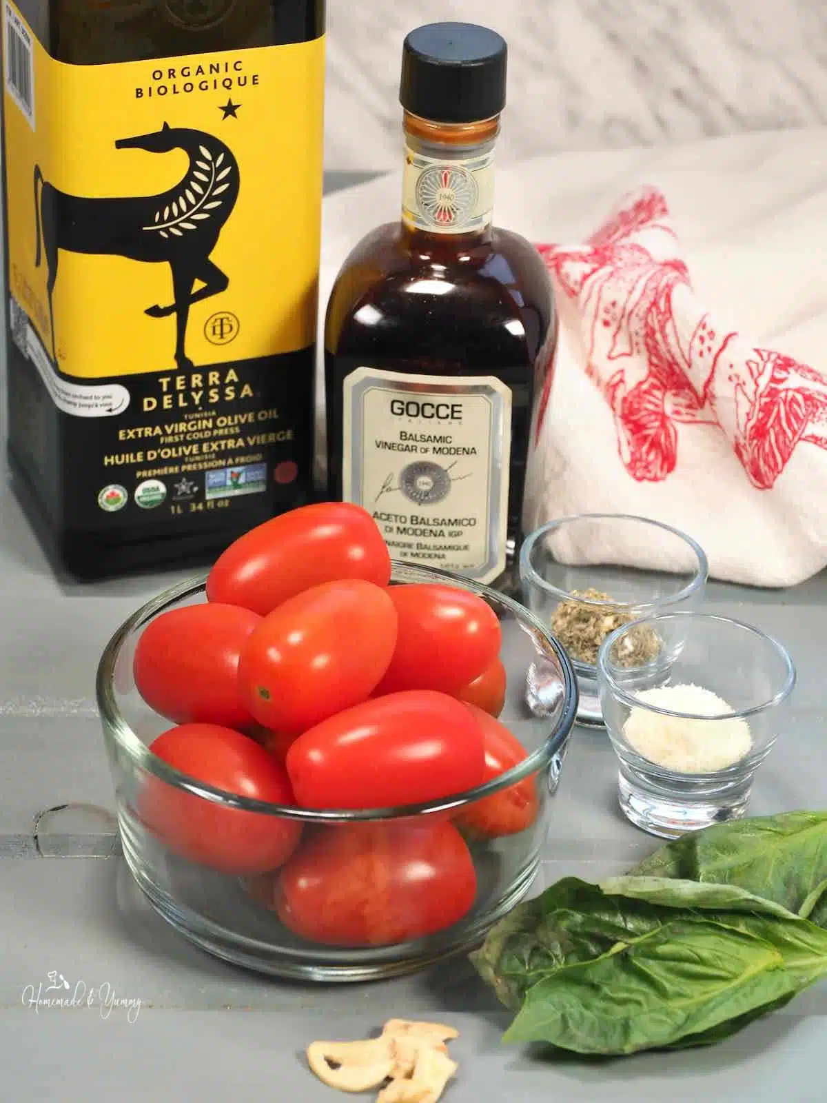 Ingredients for making fresh tomato bruschetta.