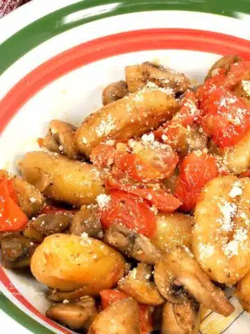 Baked gnocchi with mushrooms and tomatoes.