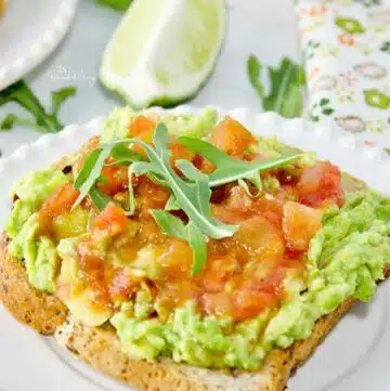 Smashed Avocado Toast topped with salsa.