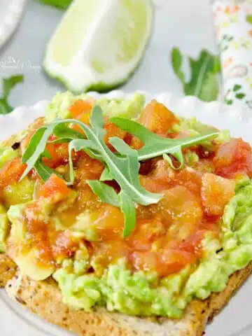 Smashed Avocado Toast topped with salsa.