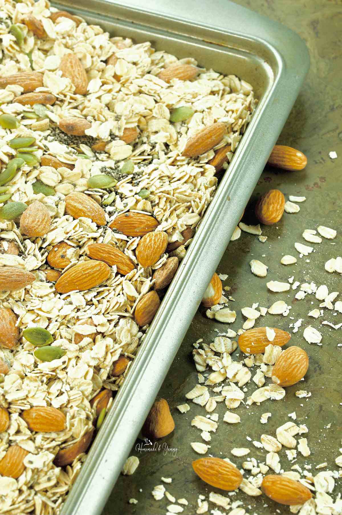Roasting nuts and seeds to make homemade granola.
