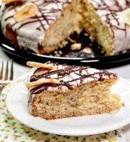 Best banana cake topped with banana icing and chocolate drizzle.