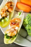 Sweet and spicy shrimp appetizers in endive leaves.